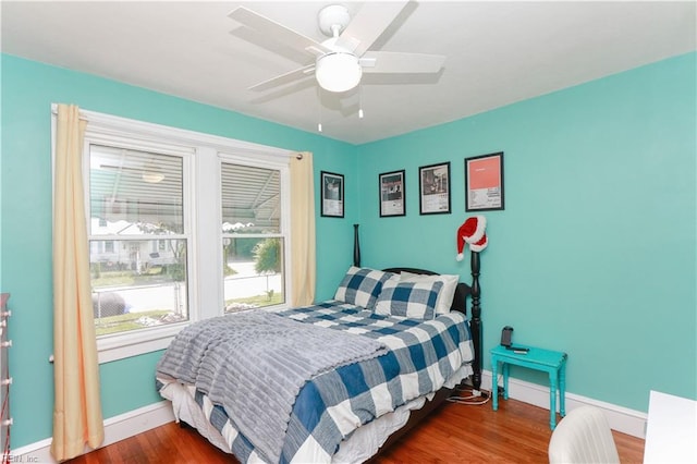 327 Brightwood Ave, Hampton, VA 23661 - bedroom featuring baseboards, wood finished floors, and a ceiling fan