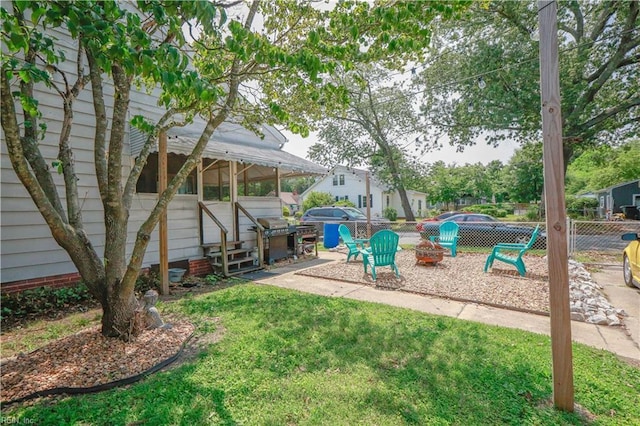 327 Brightwood Ave, Hampton, VA 23661 - view of yard featuring entry steps and a fire pit