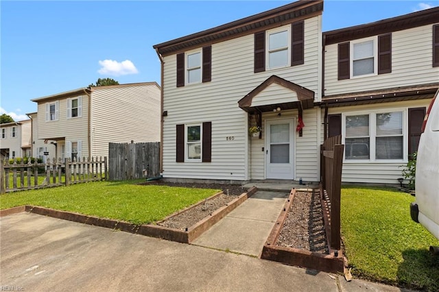 560 Davis St, Virginia Beach, VA 23462 - townhome / multi-family property with a patio