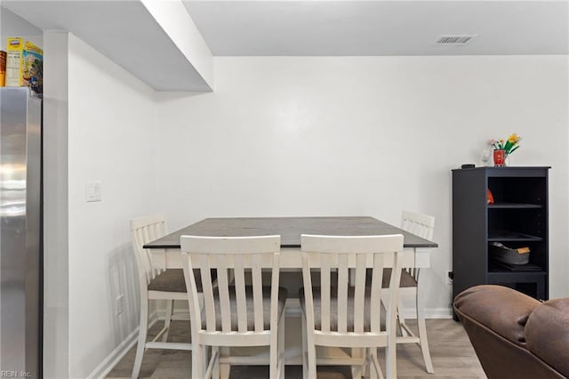560 Davis St, Virginia Beach, VA 23462 - dining area with wood finished floors and baseboards