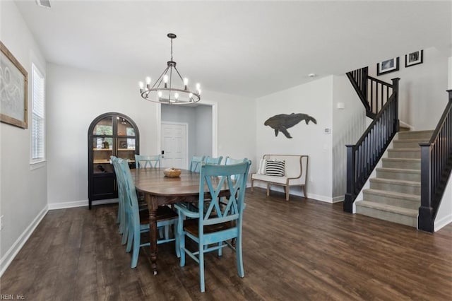 1906 Briton Ln, Chesapeake, VA 23322 - dining area featuring a chandelier, wood finished floors, stairway, and baseboards