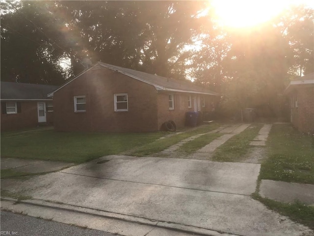 3227 Vimy Ridge Ave, Norfolk, VA 23509 - view of home's exterior featuring driveway and a lawn