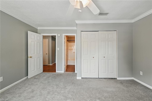 915 Spinnaker Ct, Chesapeake, VA 23320 - unfurnished bedroom featuring carpet, a closet, ornamental molding, baseboards, and a ceiling fan