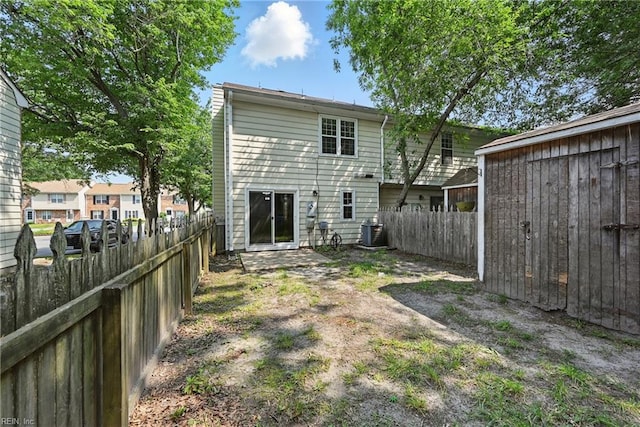 915 Spinnaker Ct, Chesapeake, VA 23320 - rear view of property with a fenced backyard and central AC
