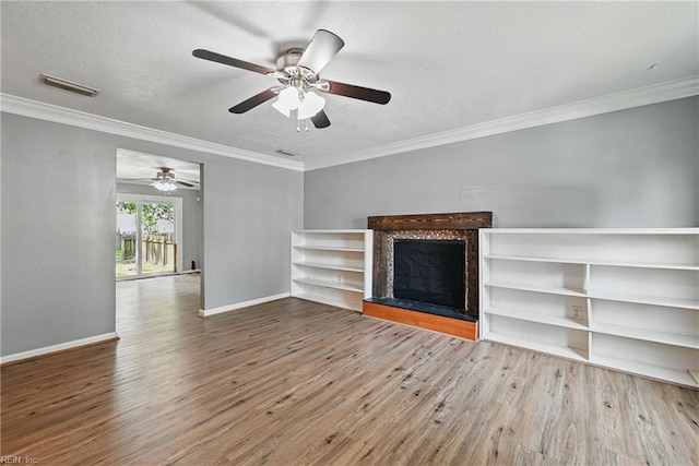 915 Spinnaker Ct, Chesapeake, VA 23320 - unfurnished living room featuring wood finished floors, a fireplace with raised hearth, baseboards, crown molding, and a ceiling fan