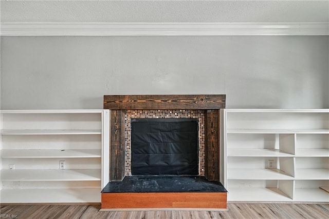 915 Spinnaker Ct, Chesapeake, VA 23320 - detailed view of wood finished floors, ornamental molding, and a fireplace