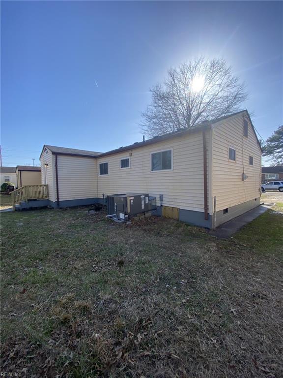 711 Vellines Ave, Chesapeake, VA 23324 - rear view of property featuring crawl space, a yard, and cooling unit