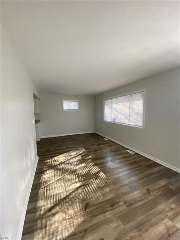 711 Vellines Ave, Chesapeake, VA 23324 - spare room featuring wood finished floors and baseboards