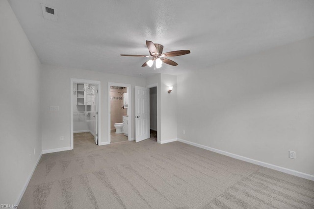 105 Londonderry Ln, Williamsburg, VA 23188 - unfurnished bedroom with a spacious closet, carpet floors, and baseboards