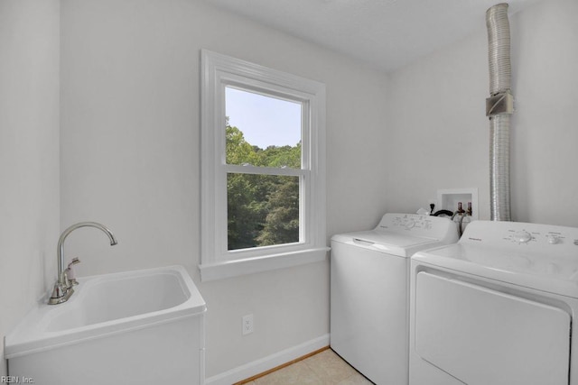 105 Londonderry Ln, Williamsburg, VA 23188 - washroom featuring separate washer and dryer and baseboards