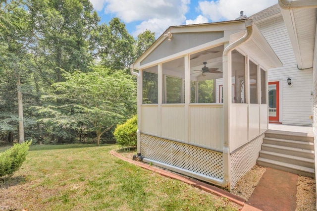 105 Londonderry Ln, Williamsburg, VA 23188 - view of side of property with a sunroom and a lawn