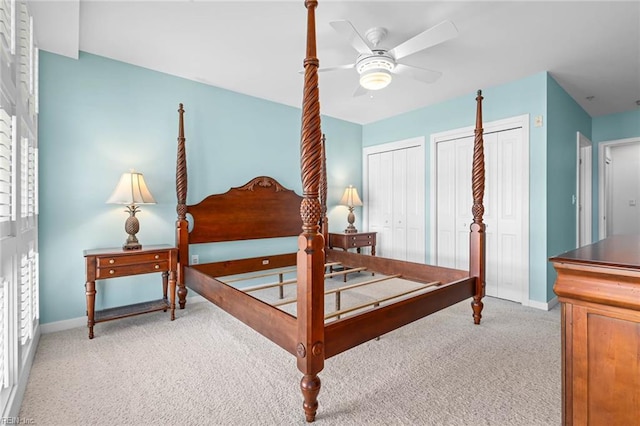 3738 Sandpiper Rd Unit 413, Virginia Beach, VA 23456 - bedroom with light carpet, baseboards, multiple closets, and ceiling fan
