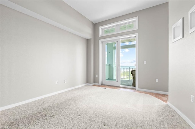 3738 Sandpiper Rd Unit 413, Virginia Beach, VA 23456 - unfurnished room with light carpet and baseboards