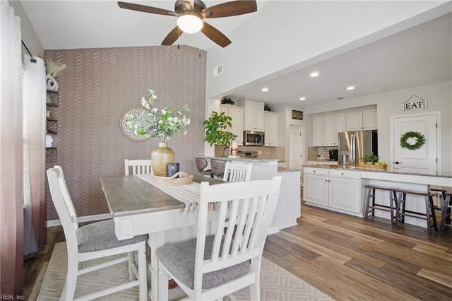 2685 Robert Monette Ln, Virginia Beach, VA 23456 - dining space with wood finished floors, a ceiling fan, and recessed lighting