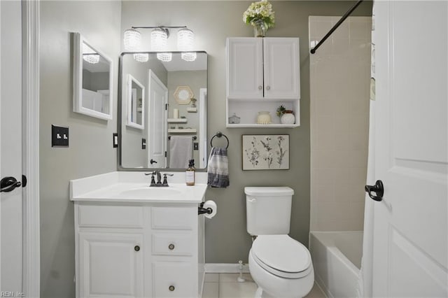 2685 Robert Monette Ln, Virginia Beach, VA 23456 - bathroom featuring vanity, toilet, tub / shower combination, baseboards, and tile patterned flooring
