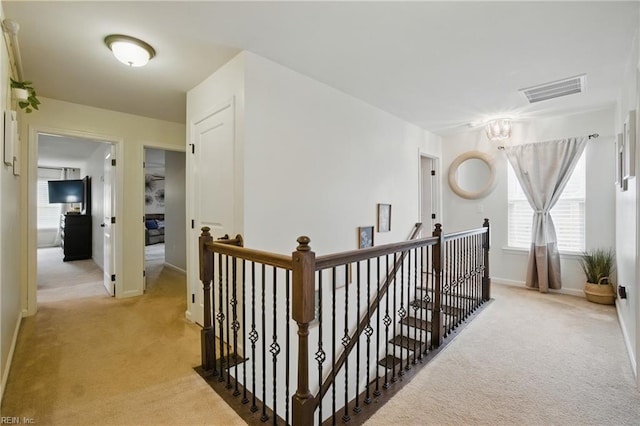 2685 Robert Monette Ln, Virginia Beach, VA 23456 - hall featuring an upstairs landing, light colored carpet, and baseboards