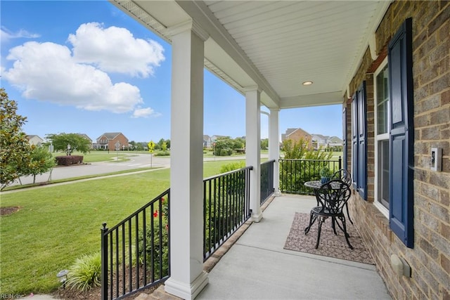 2685 Robert Monette Ln, Virginia Beach, VA 23456 - covered porch with a residential view and a yard