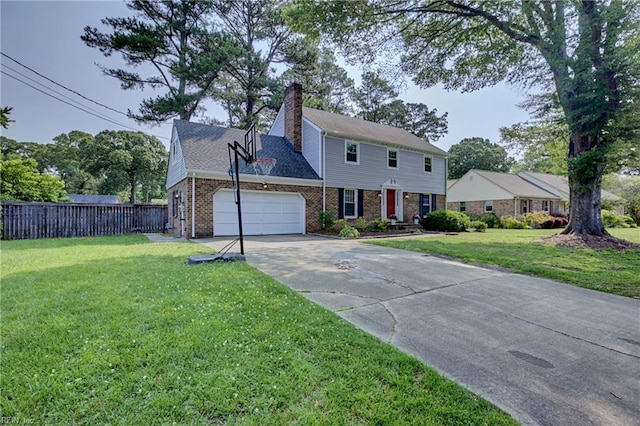 405 Bartell Dr, Chesapeake, VA 23322 - view of front of property with a garage, driveway, brick siding, and a chimney