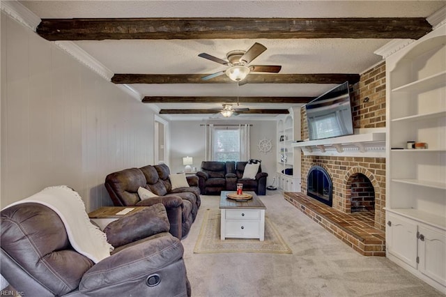 405 Bartell Dr, Chesapeake, VA 23322 - living room featuring ceiling fan, beam ceiling, light carpet, a fireplace, and built in shelves