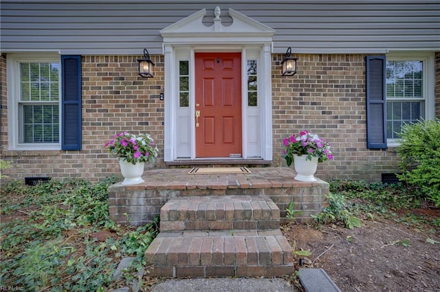 405 Bartell Dr, Chesapeake, VA 23322 - doorway to property with crawl space and brick siding