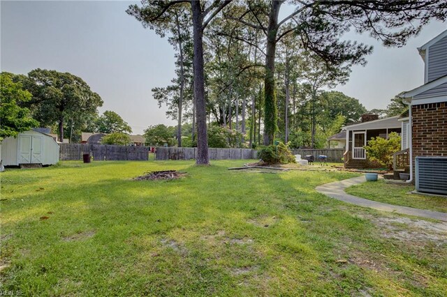405 Bartell Dr, Chesapeake, VA 23322 - view of yard with central AC unit and a sunroom