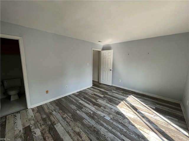 419 Marsh Duck Way, Virginia Beach, VA 23451 - unfurnished bedroom featuring dark wood finished floors and baseboards