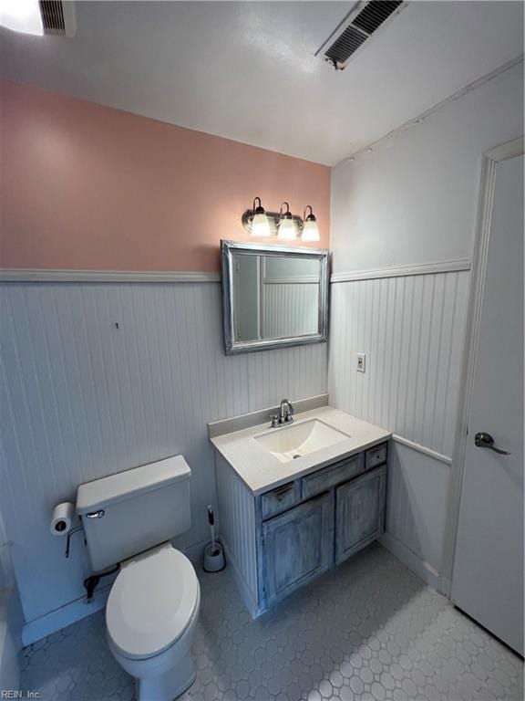 419 Marsh Duck Way, Virginia Beach, VA 23451 - bathroom with wainscoting, vanity, toilet, and tile patterned floors