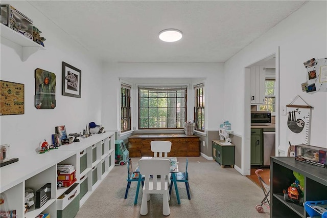 1 Smith St, Poquoson, VA 23662 - dining area featuring baseboards and light colored carpet
