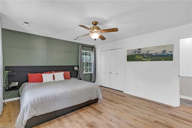 1 Smith St, Poquoson, VA 23662 - bedroom with light wood finished floors, baseboards, a ceiling fan, and a closet