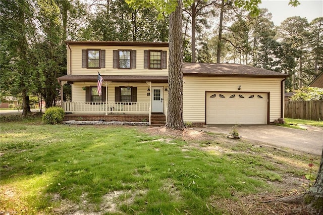 1 Smith St, Poquoson, VA 23662 - traditional-style home with covered porch, a garage, and concrete driveway