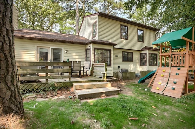 1 Smith St, Poquoson, VA 23662 - back of property with a playground and a deck