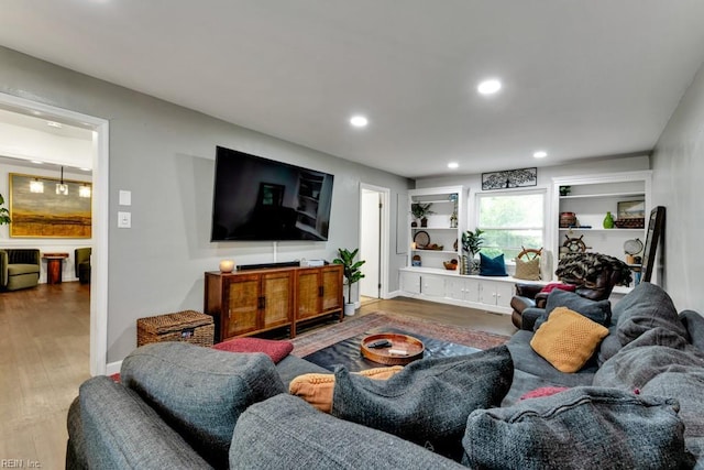 401 Kings Point Rd, Virginia Beach, VA 23452 - living area with wood finished floors, recessed lighting, and baseboards