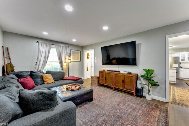 401 Kings Point Rd, Virginia Beach, VA 23452 - living room with wood finished floors, recessed lighting, and baseboards