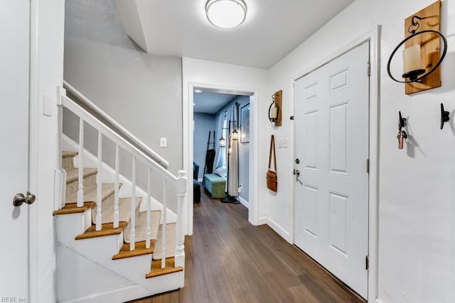 401 Kings Point Rd, Virginia Beach, VA 23452 - entrance foyer with stairs, dark wood-style flooring, and baseboards