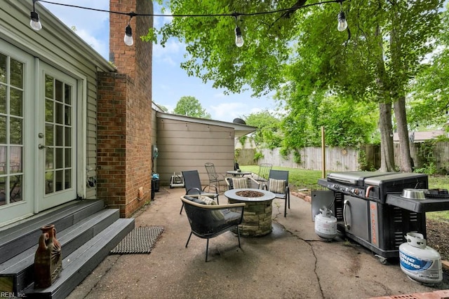 401 Kings Point Rd, Virginia Beach, VA 23452 - view of patio featuring a fire pit, french doors, and entry steps