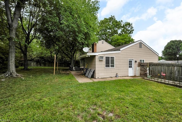 401 Kings Point Rd, Virginia Beach, VA 23452 - back of house with a chimney and a patio area
