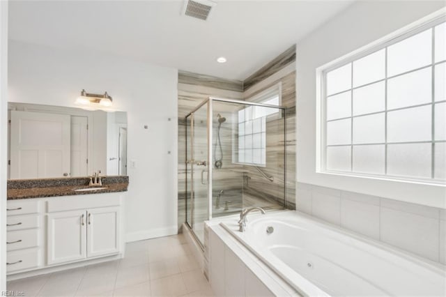 1652 Teton Ct, Chesapeake, VA 23320 - full bath featuring a whirlpool tub, a shower stall, vanity, and baseboards