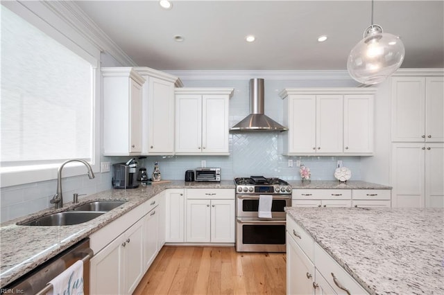 120 55th 1/2 St, Virginia Beach, VA 23451 - kitchen with appliances with stainless steel finishes, wall chimney range hood, a sink, white cabinets, and tasteful backsplash