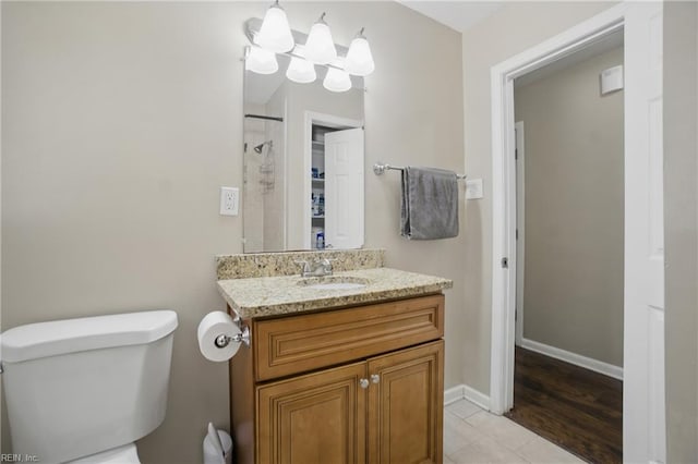 2613 Cedar Rd, Chesapeake, VA 23323 - full bath with vanity, toilet, a shower, baseboards, and tile patterned flooring