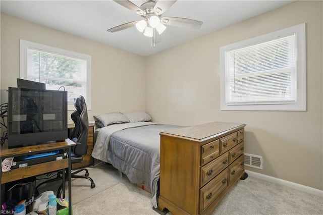 2613 Cedar Rd, Chesapeake, VA 23323 - bedroom with light carpet, baseboards, and ceiling fan