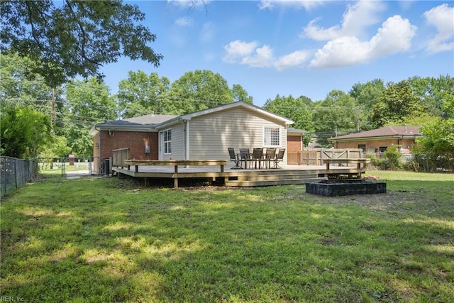 2613 Cedar Rd, Chesapeake, VA 23323 - back of property featuring a deck and outdoor dining space