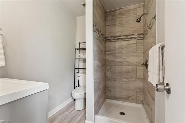 3054 Comte Ct, Virginia Beach, VA 23453 - full bath with toilet, a stall shower, vanity, baseboards, and wood finished floors