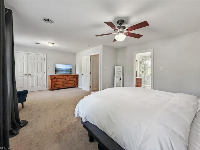5891 Chaucer Dr, Providence Forge, VA 23140 - bedroom featuring light colored carpet, ensuite bath, and ceiling fan