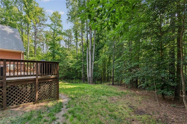 5891 Chaucer Dr, Providence Forge, VA 23140 - view of yard featuring a deck and a forest view