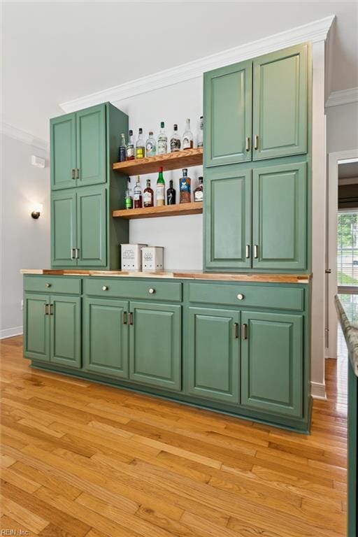 5891 Chaucer Dr, Providence Forge, VA 23140 - indoor dry bar with ornamental molding, light wood-style floors, and baseboards