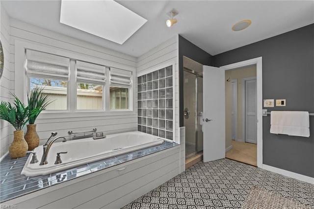 211 86th St Unit F, Virginia Beach, VA 23451 - full bath with a skylight, a shower stall, and a bath