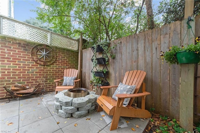 211 86th St Unit F, Virginia Beach, VA 23451 - view of patio featuring an outdoor fire pit