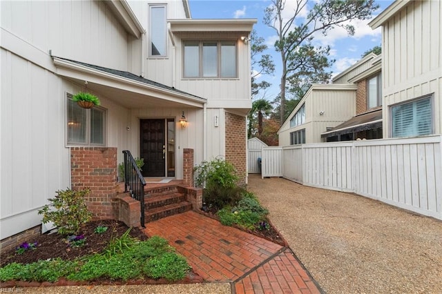 211 86th St Unit F, Virginia Beach, VA 23451 - property entrance featuring brick siding and board and batten siding