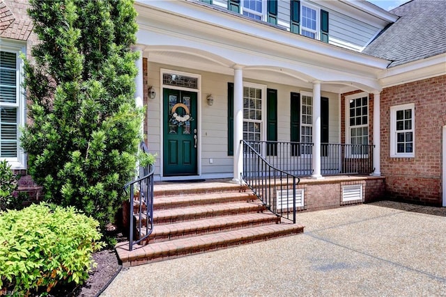 200 Cruden Bay, Williamsburg, VA 23188 - property entrance with a shingled roof, covered porch, and brick siding