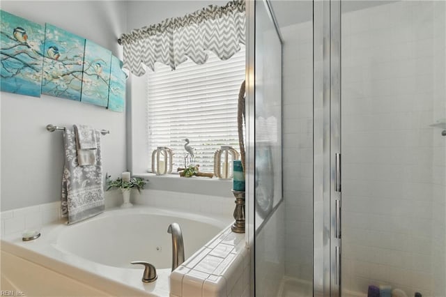 13435 Prince Andrew Trl, Carrollton, VA 23314 - bathroom featuring a tub with jets and a stall shower